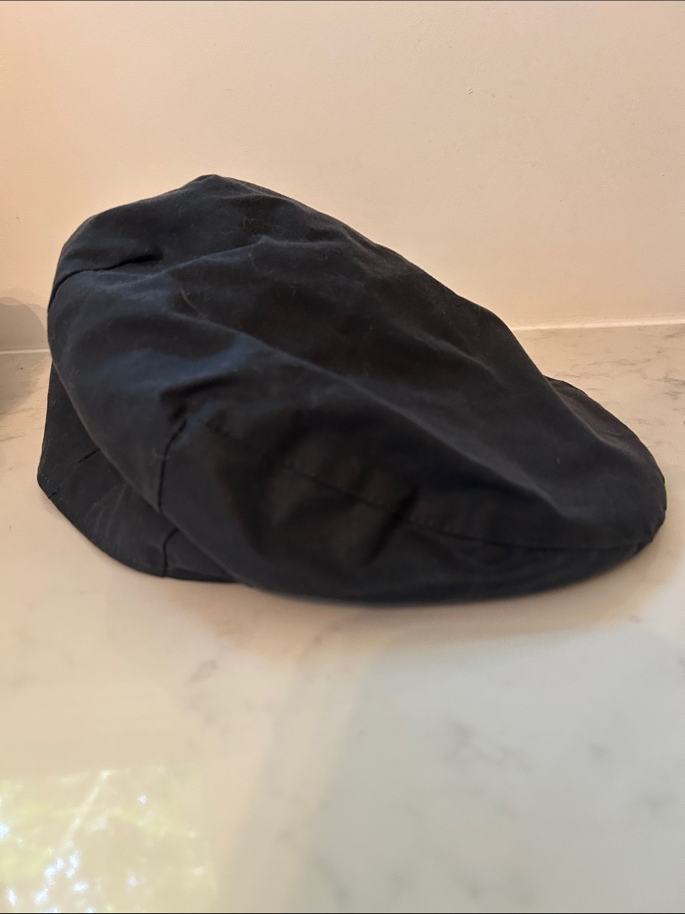 Navy waxed flat newsboy cap